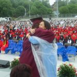 Kelly Garcia Hugging Chelsea High School graduate