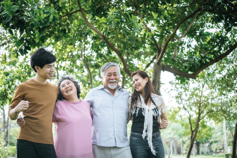 happy family walking outdoor in the park