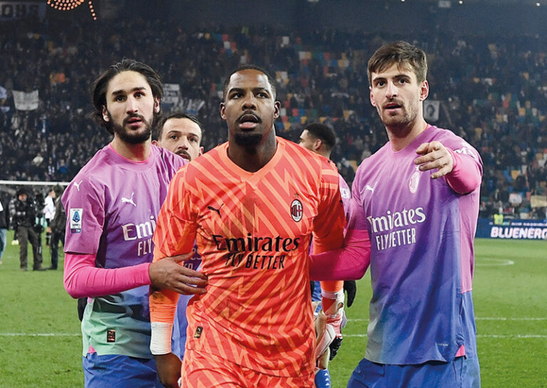 Soccer Football - Serie A - Udinese v AC Milan - Dacia Arena, Udine, Italy - January 20, 2024 AC Milan's Mike Maignan, Yacine Adli and Matteo Gabbia celebrate after the match
