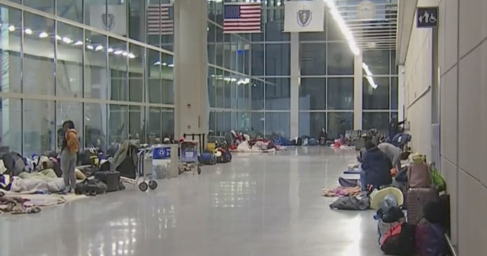 Migrants Boston Logan Airport