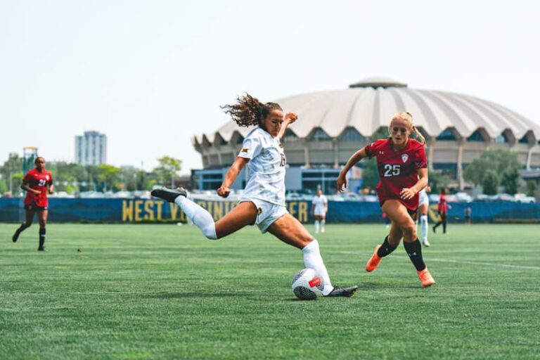 Originaria de New Bedford, ha jugado al fútbol durante 17 años de su vida y ha sido convocada dos veces a la Selección Nacional de su país