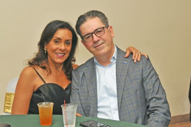 Pareja en evento de Milagros Marte