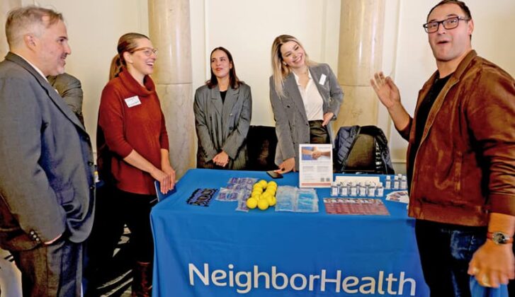 NeighborhHealth Magic: Nico Smietniansky, Emily Martin, Andrea Acevedo Beltran, and Susana Elman of NeighborHealth not only offered great resources and information, but they were also entertained by magician and DJ extraordinaire Mike Charles (DJ Magic Mic).